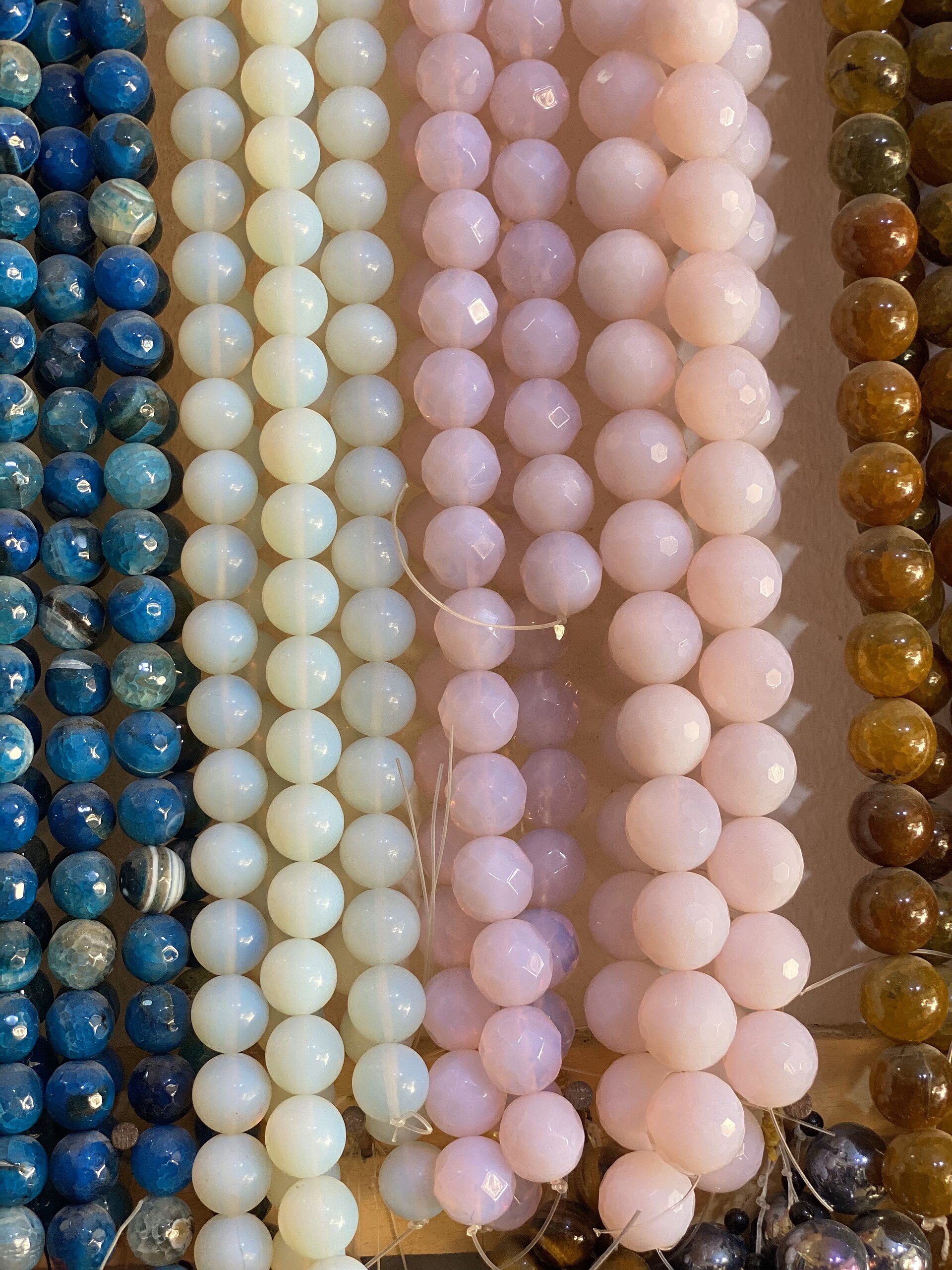Strands of natural gemstone beads