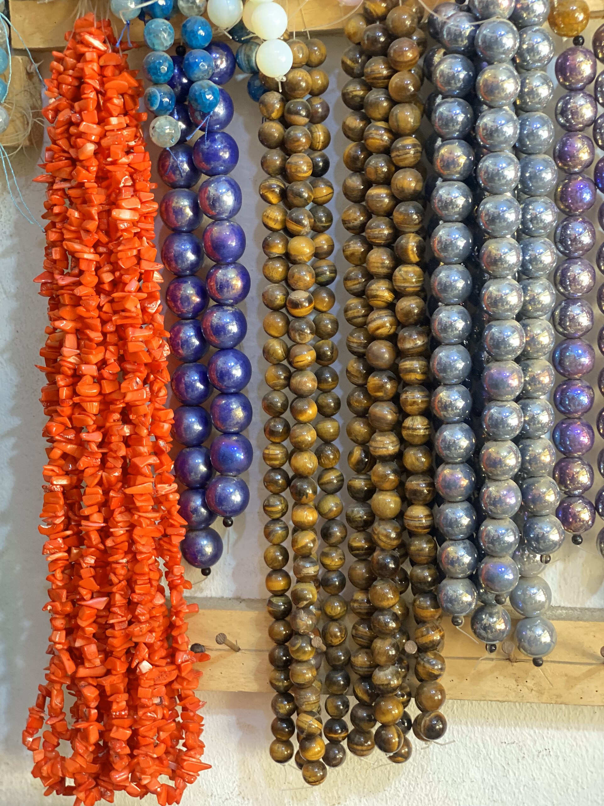 Strands of natural gemstone beads